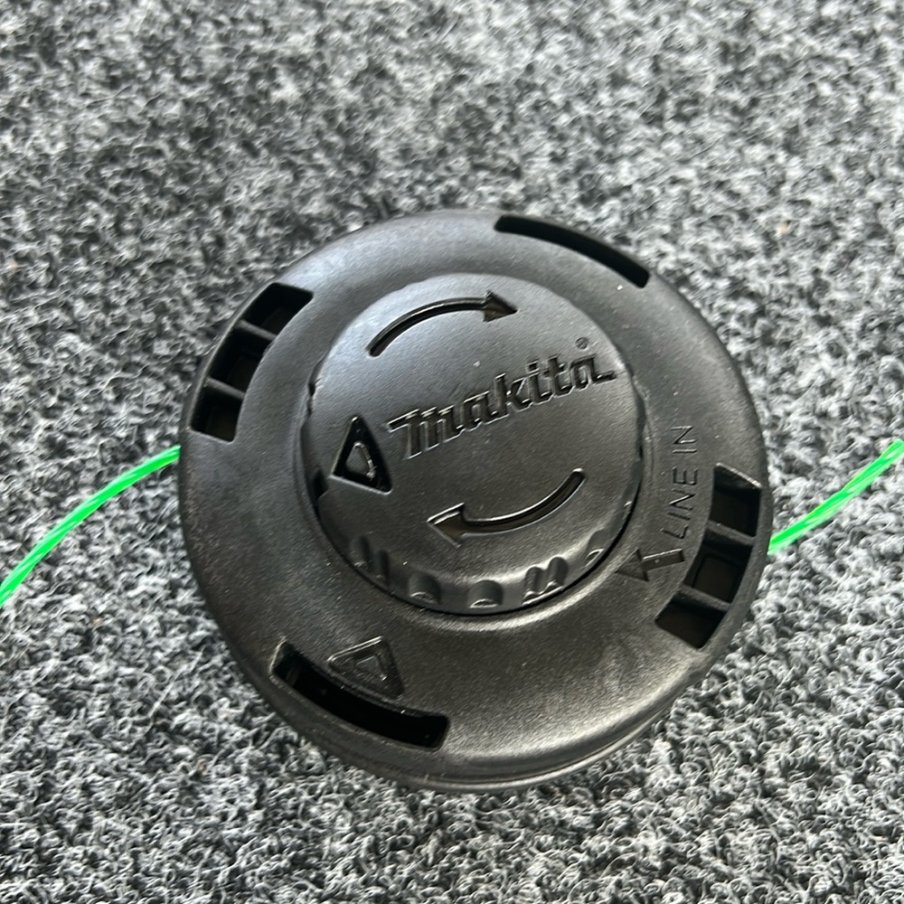 Makita string trimmer head.  Tap & Go